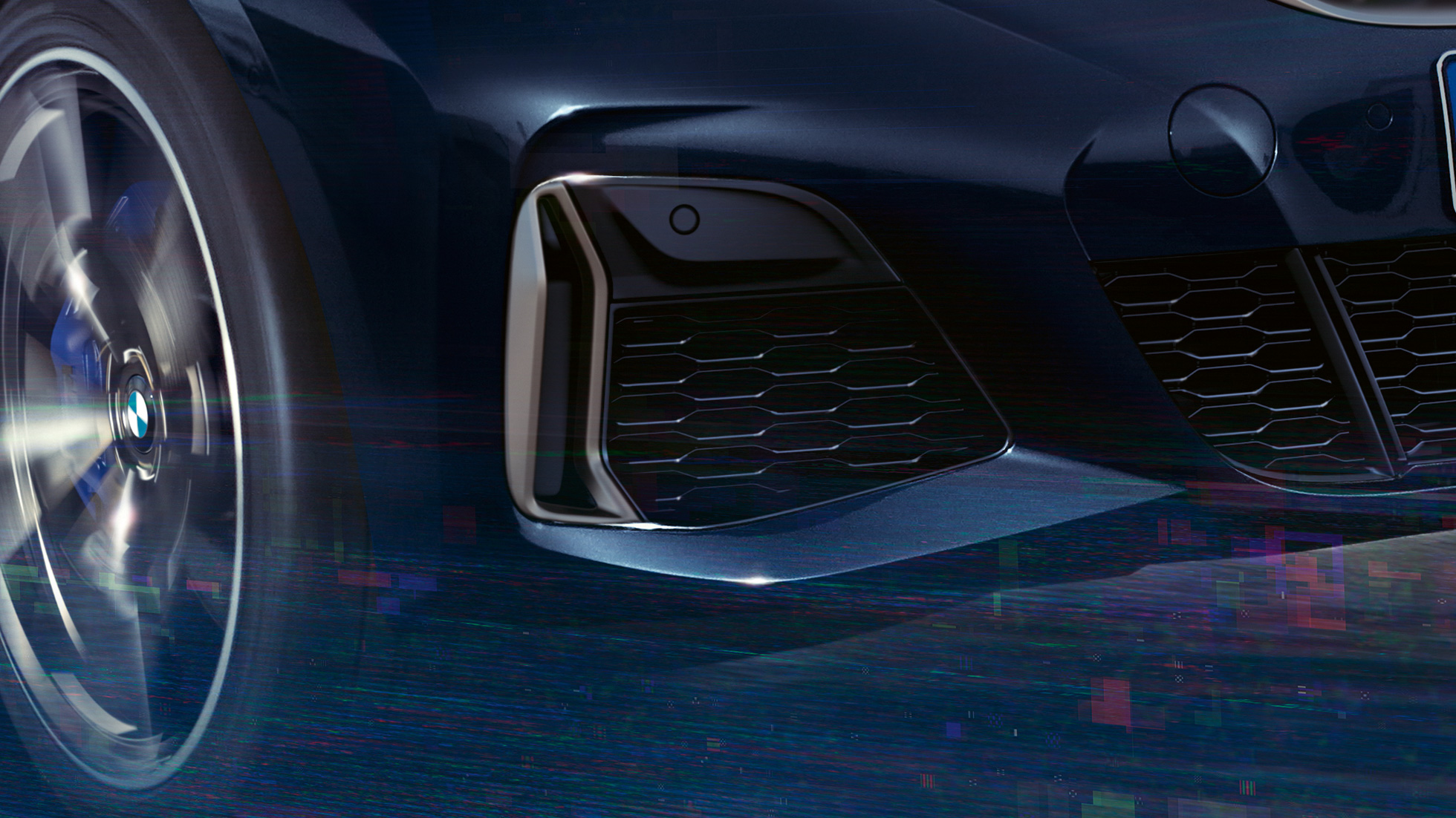 Detaied side view of the BMW 3 Series Sedan air inlets in Cerium grey metallic.