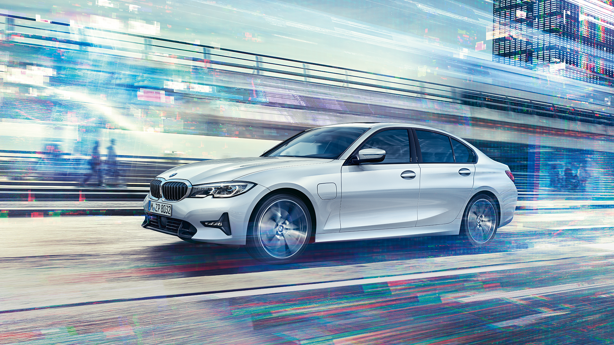 Side view of the driving BMW 3 Series Sedan 330e in front of urban backround.