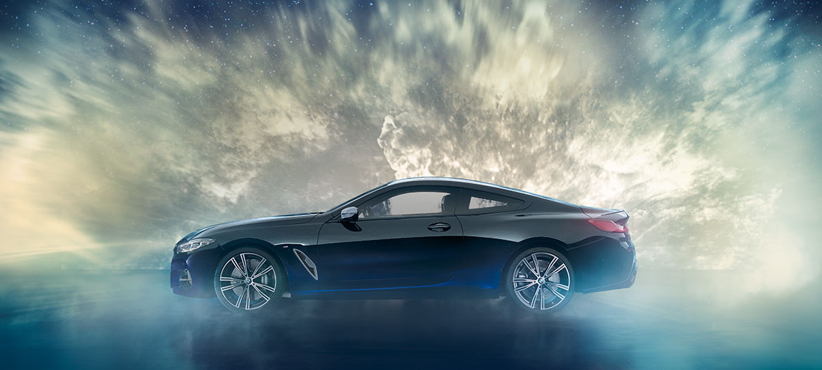 The BMW Individual M850i NIGHT SKY in a side view still shot