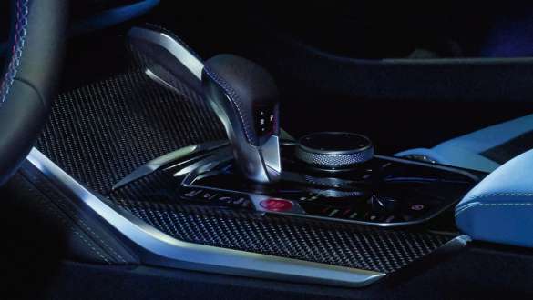 BMW M4 Competition Coupé G82 2020 8-speed M Steptronic transmission close-up centre console interior